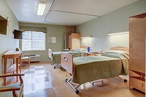 A shared bedroom for residents at Monroeville